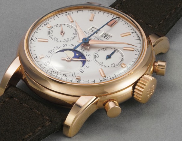 An extremely rare, attractive and exceptionally well preserved pink gold perpetual calendar chronograph wristwatch with moonphases